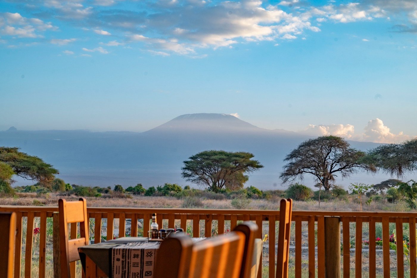 View of snow-capped Kilimanjaro across the plains from the deck at Amboseli Wildebeest Camp.