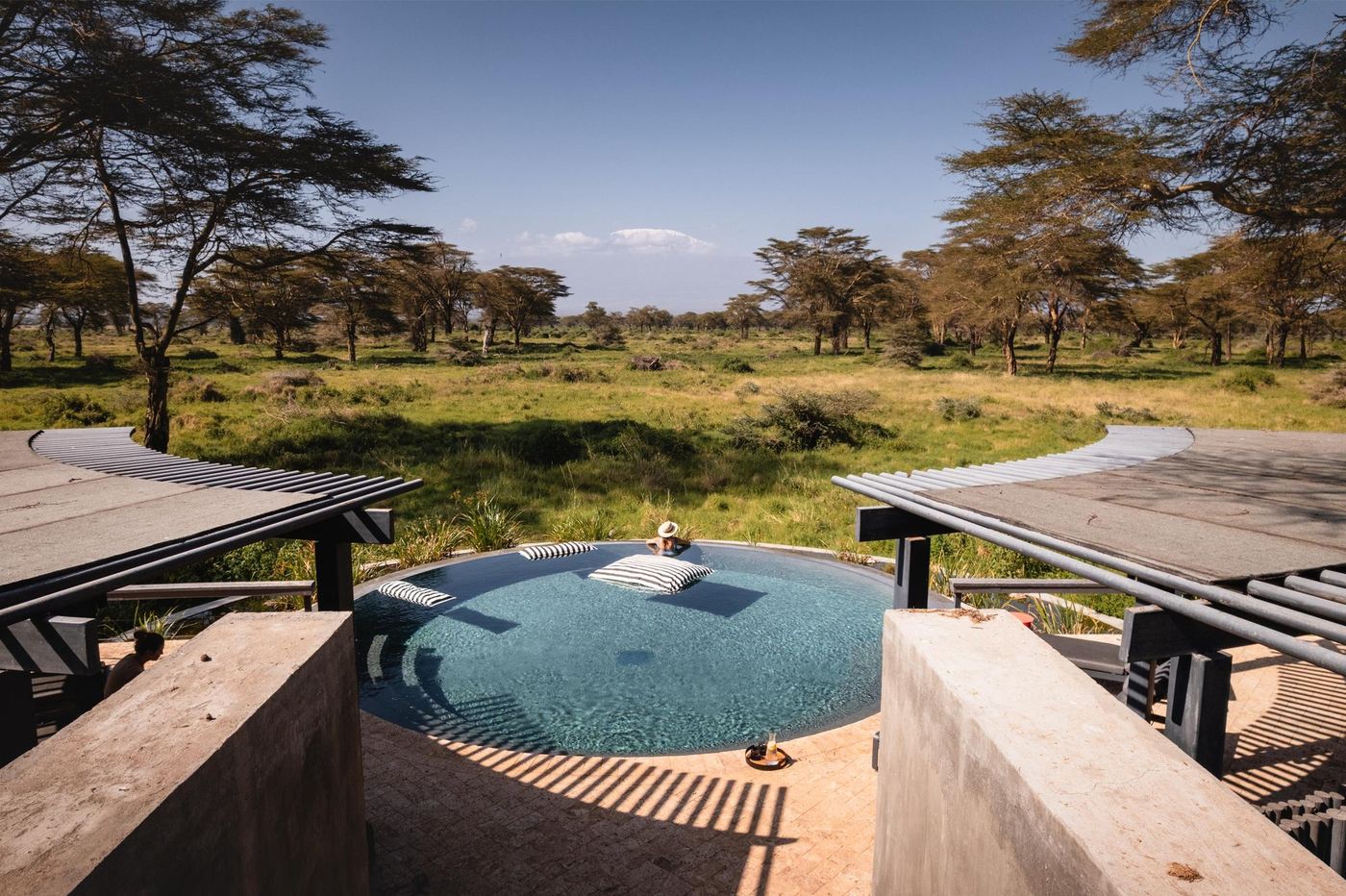 Private plunge pool between two suites facing the open plains at Angama Amboseli.