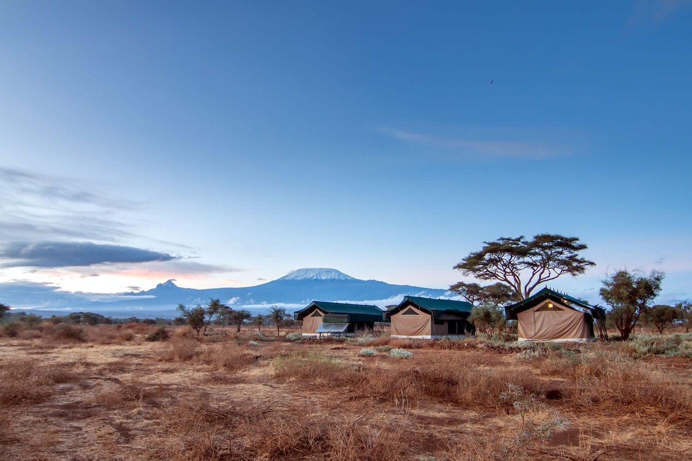 View of Kilimanjaro over the plains at dusk from Kibo Safari Camp.