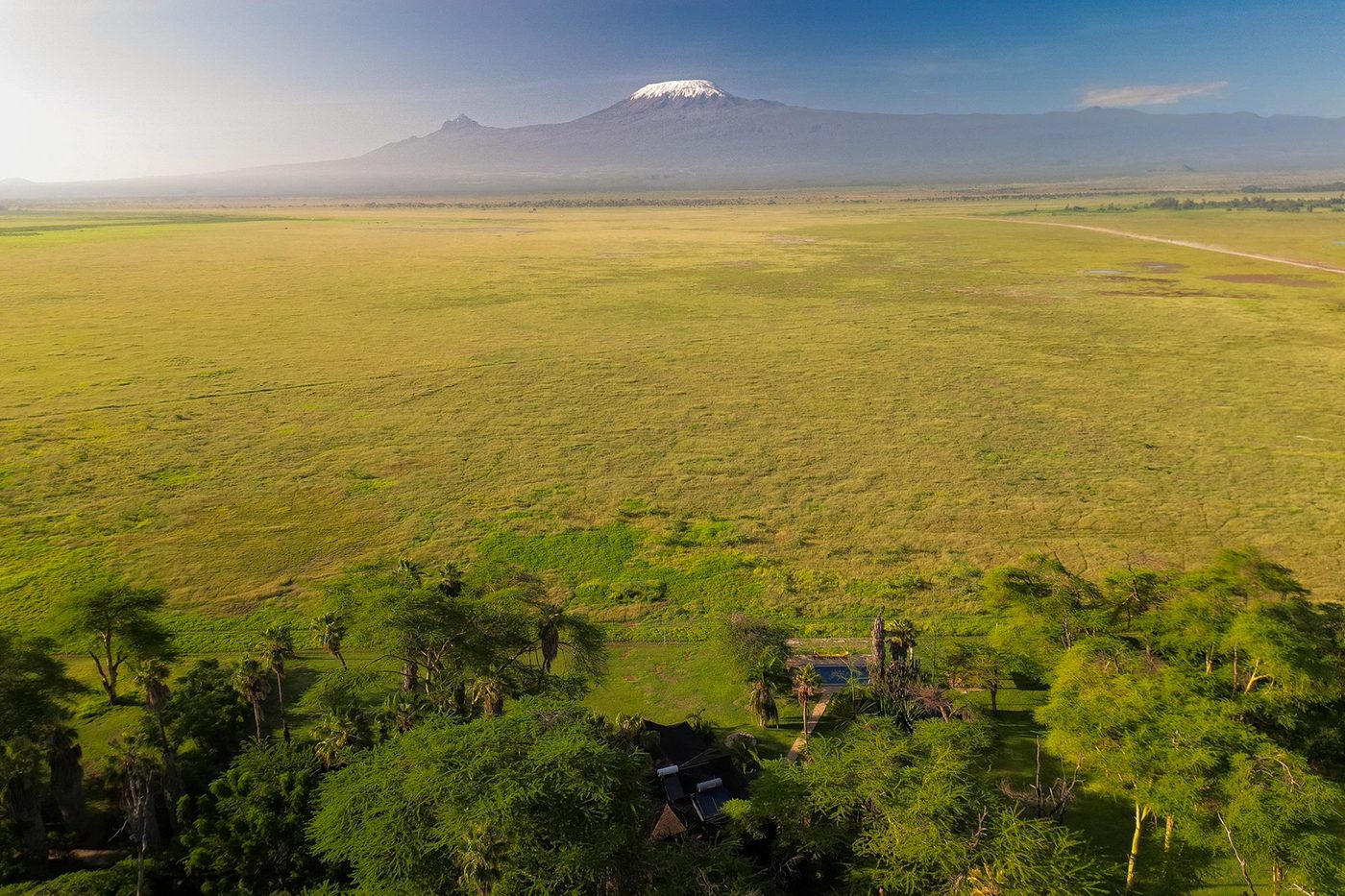 Sweeping view of the savanna toward Kilimanjaro from the grounds of Kibo Villa.